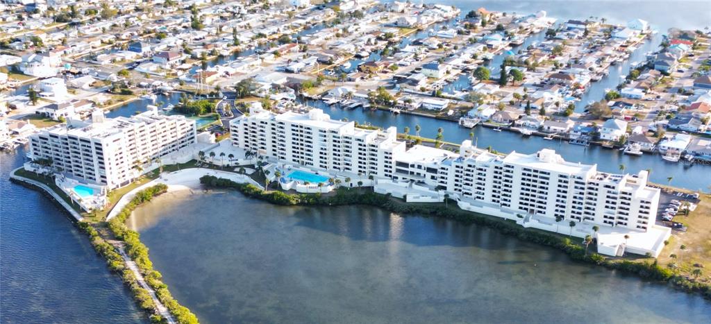 5915 Sea Ranch Drive, Unit 704 Hudson, FL 34667 - Photo 59 of 62 a view of roof deck with outdoor seating and city view