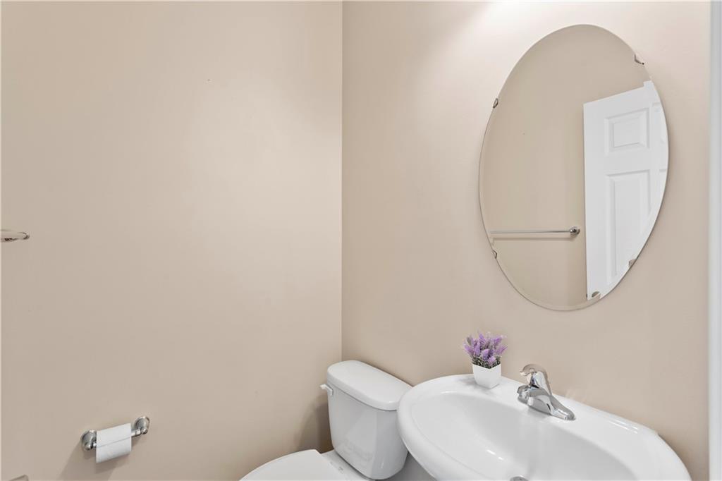 215 Long Ridge Drive Coraopolis, PA 15108 - Photo 12 of 50 a bathroom with a toilet sink and mirror