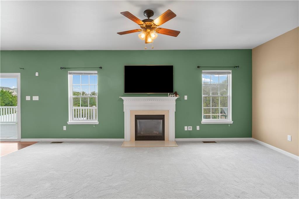 215 Long Ridge Drive Coraopolis, PA 15108 - Photo 15 of 50 a view of a livingroom with a fireplace and a window