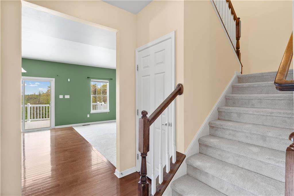215 Long Ridge Drive Coraopolis, PA 15108 - Photo 21 of 50 a view of an entryway with wooden floor and stairs