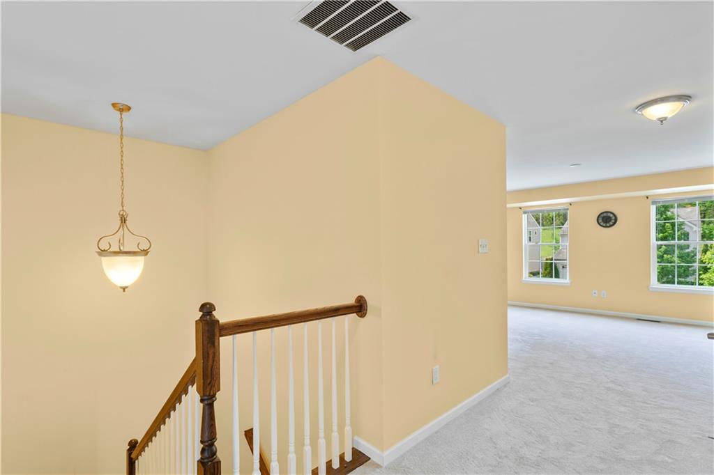 215 Long Ridge Drive Coraopolis, PA 15108 - Photo 22 of 50 a view of empty room with wooden floor