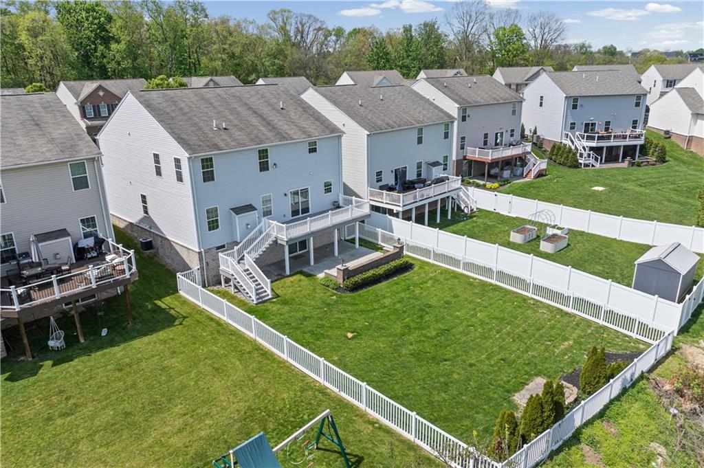 215 Long Ridge Drive Coraopolis, PA 15108 - Photo 44 of 50 Fenced in, private, with great concrete patio and deck for lots of entertaining