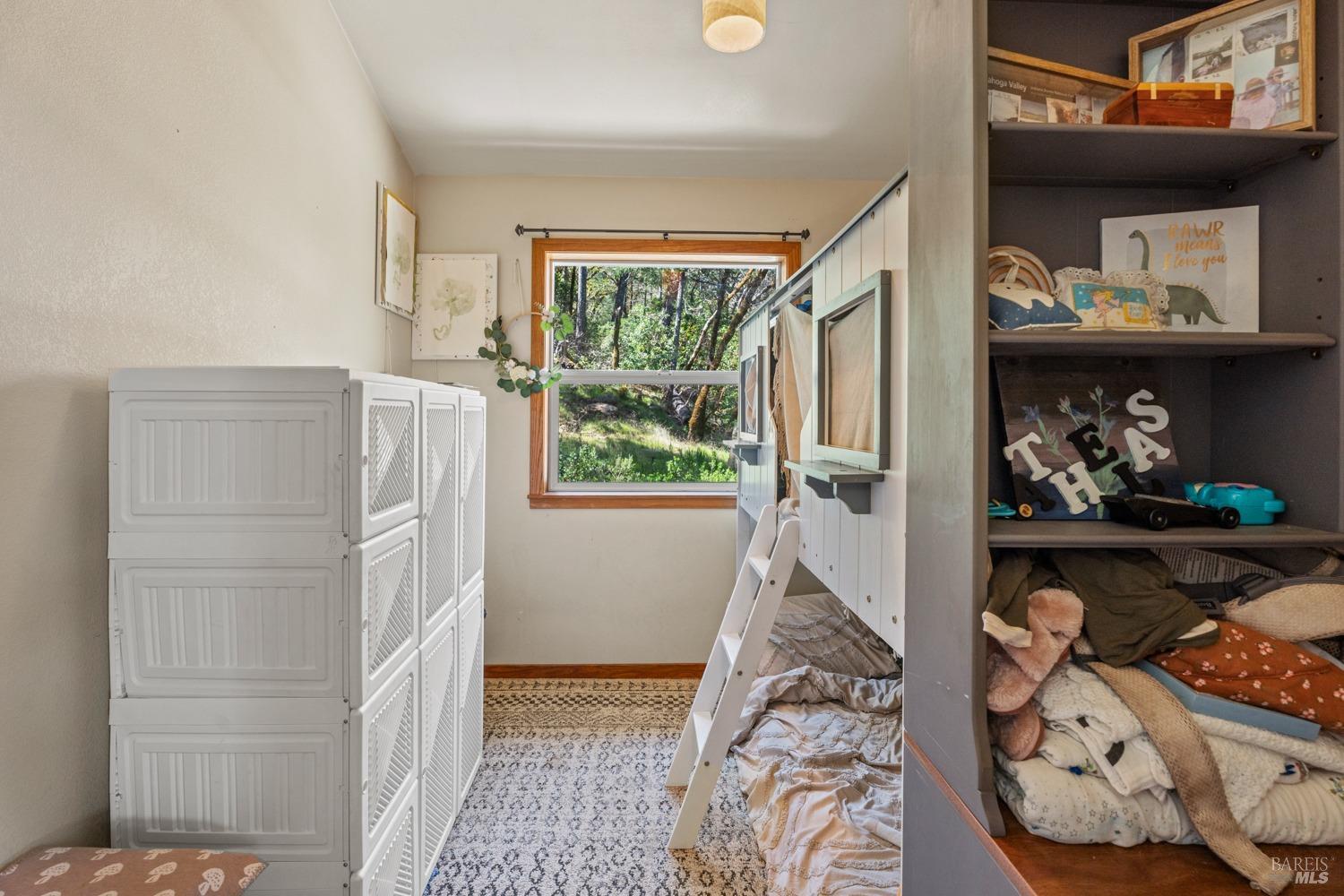 9355 Spyrock Road Laytonville, CA 95454 - Photo 11 of 22 a view of bedroom with furniture and a window