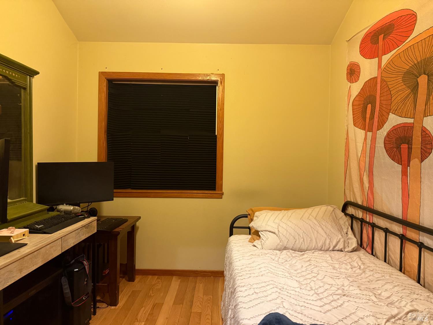 9355 Spyrock Road Laytonville, CA 95454 - Photo 20 of 22 a bedroom with a bed and a flat screen tv