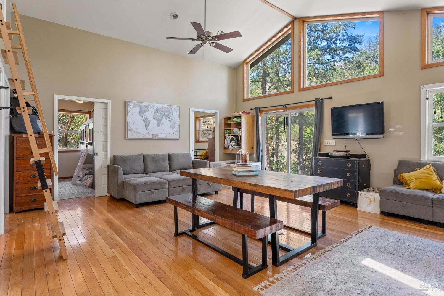 9355 Spyrock Road Laytonville, CA 95454 - Photo 4 of 22 a living room with furniture and a flat screen tv