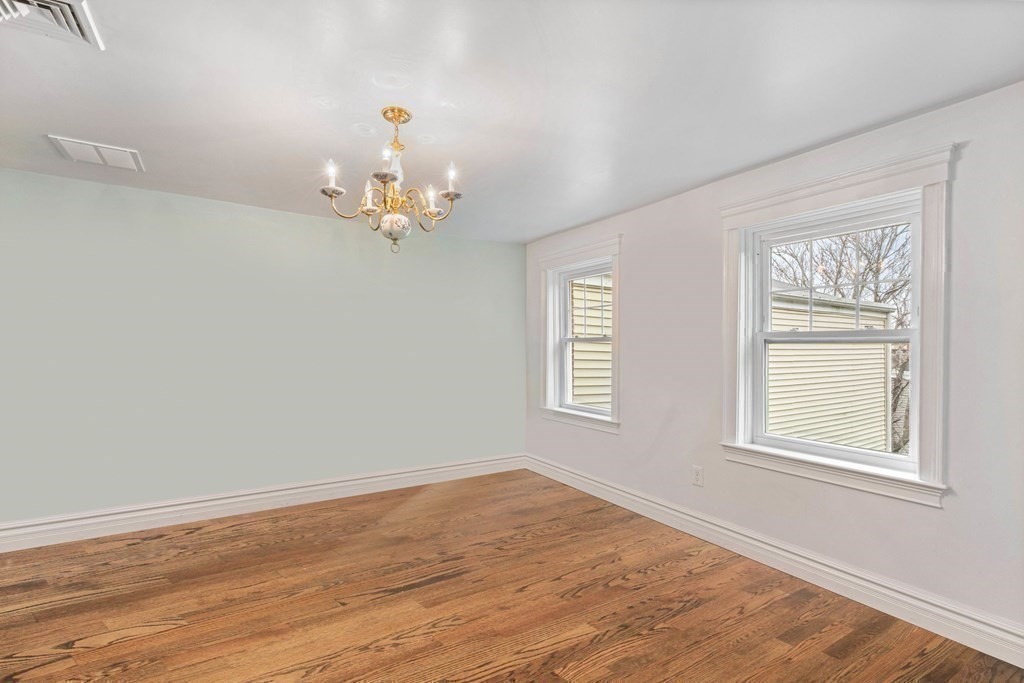 50 Baldwin Street Boston, MA 02129 - Photo 13 of 24 wooden floor in an empty room with a window