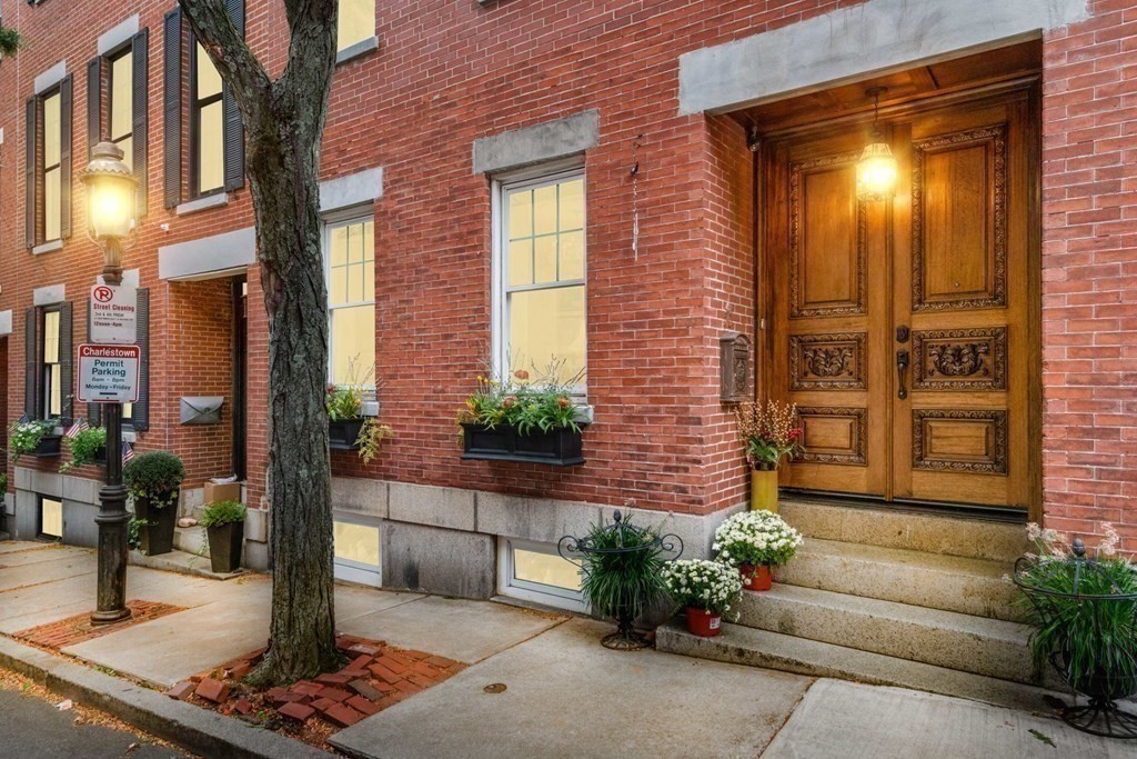 50 Baldwin Street Boston, MA 02129 - Photo 23 of 24 a front view of a house with a yard