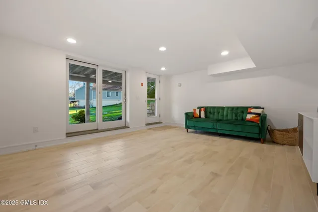 a view of an empty room with a balcony