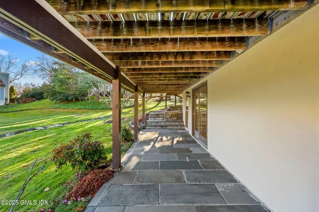 a view of a porch with a backyard