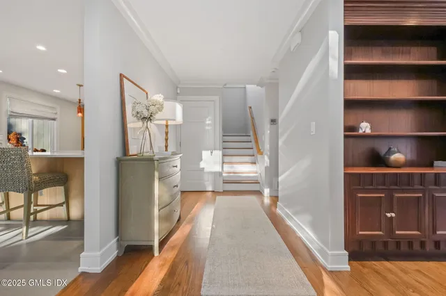 a view of a kitchen from the hallway