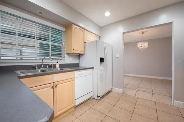 a bathroom with a sink a mirror and a bathtub
