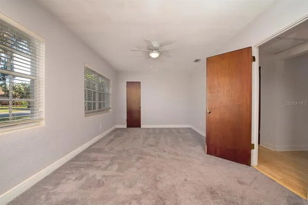 an empty room with windows