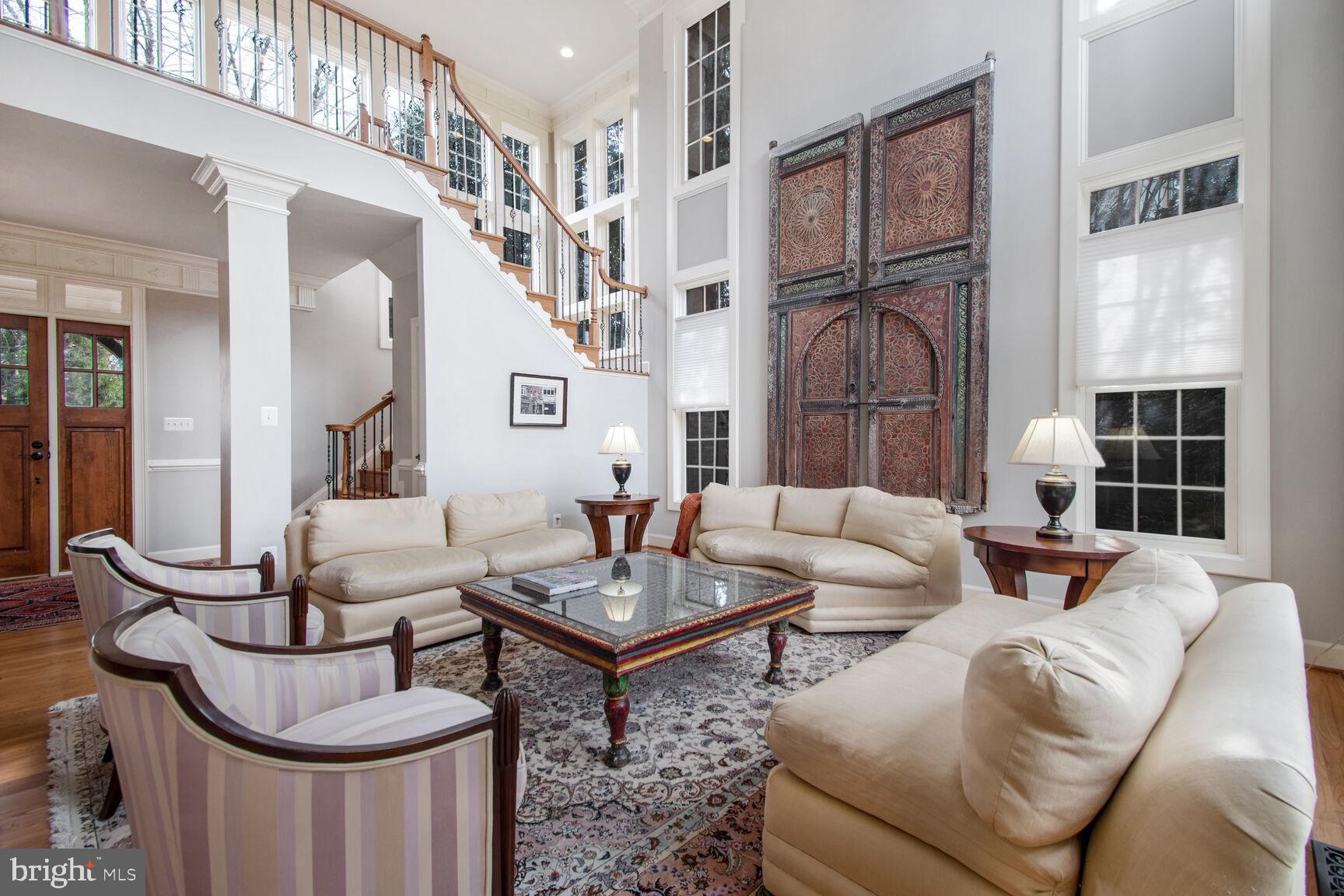 1550 Shelford Court Vienna, VA 22182 - Photo 18 of 60 a living room with fireplace furniture and a large window