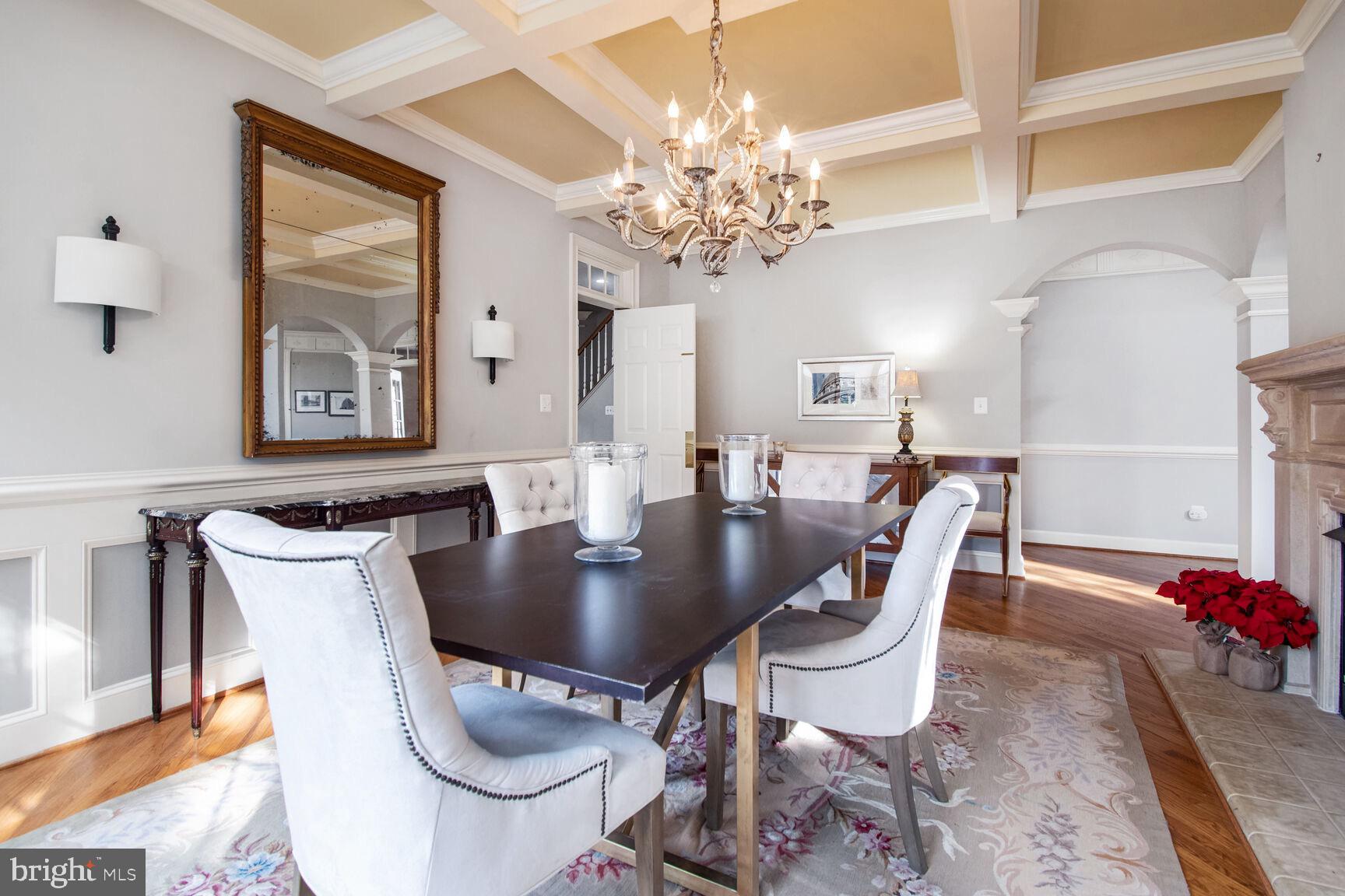 1550 Shelford Court Vienna, VA 22182 - Photo 22 of 60 a view of a dining room with furniture and chandelier