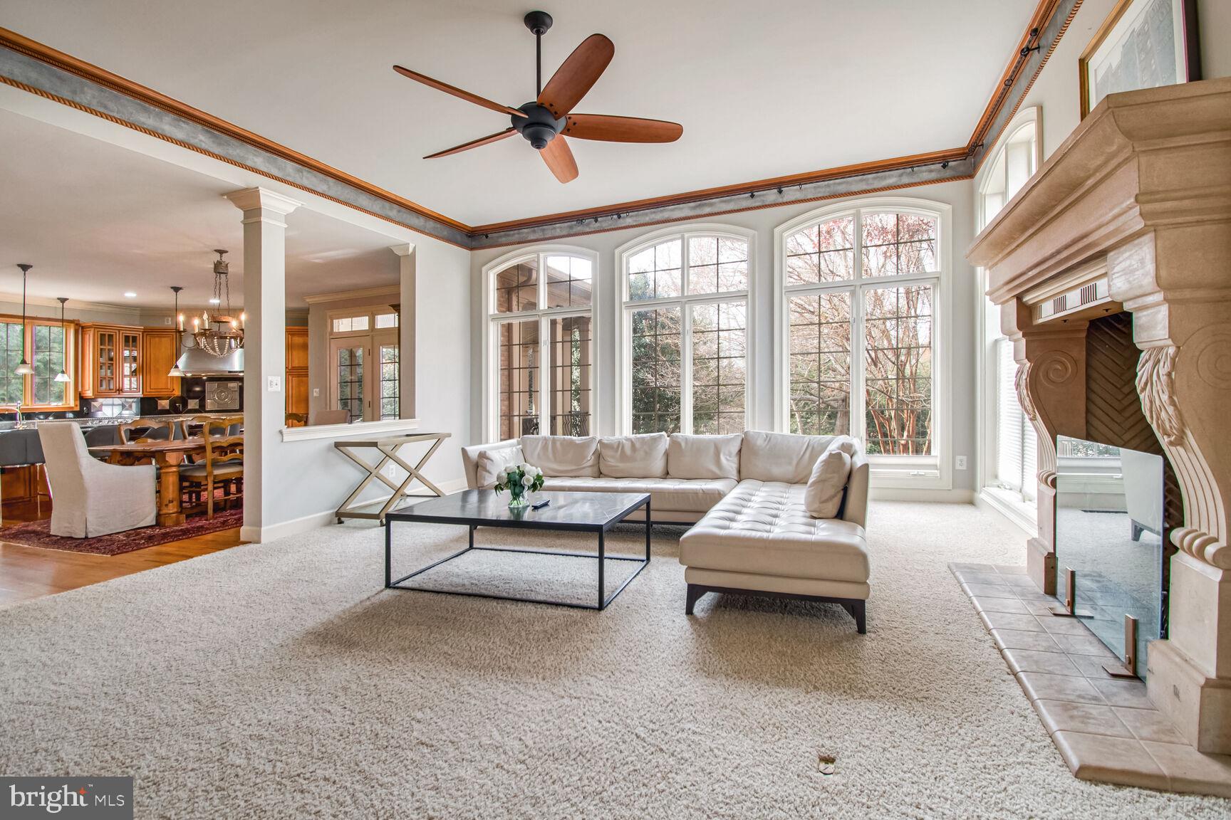 1550 Shelford Court Vienna, VA 22182 - Photo 45 of 60 a living room with furniture and a large window