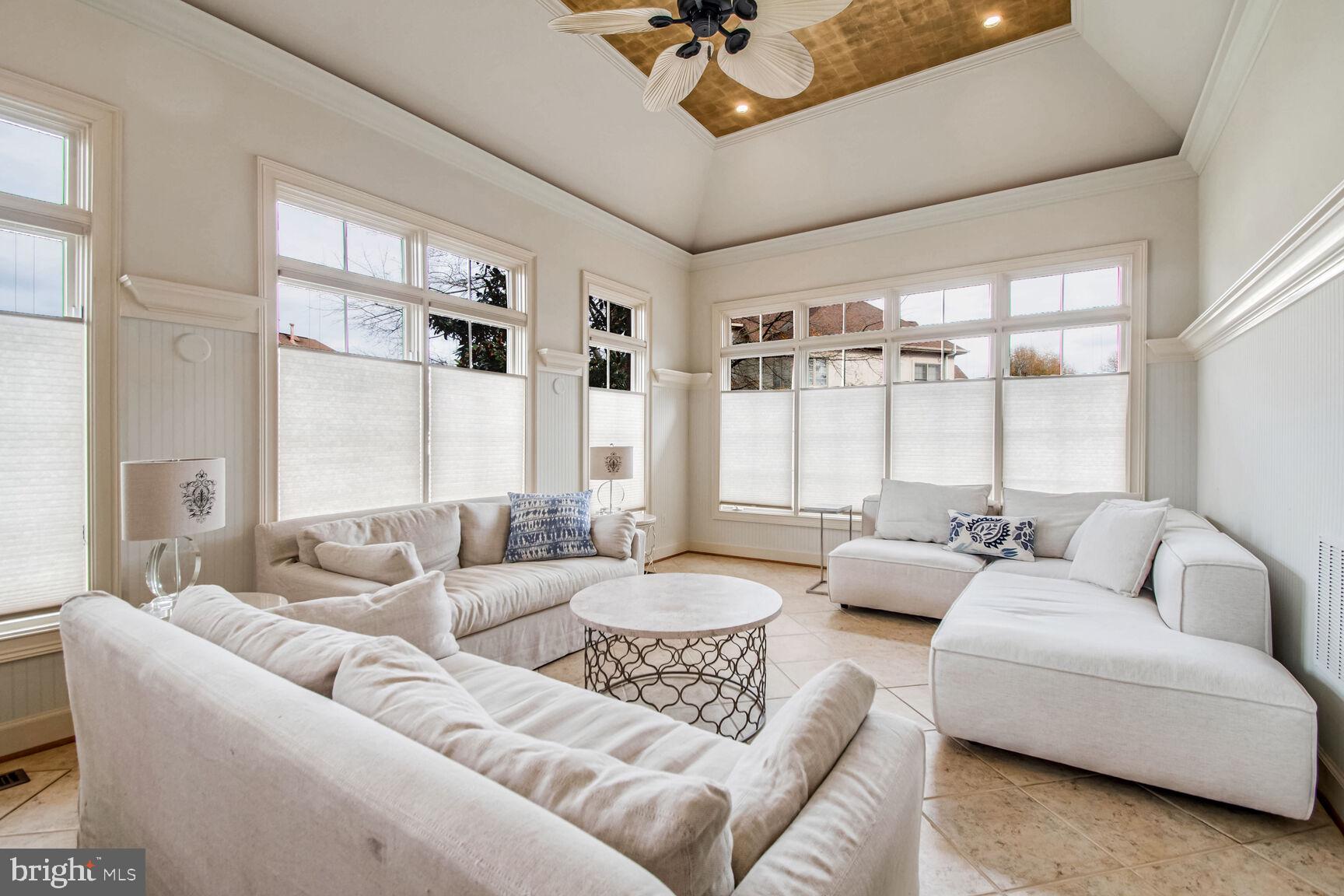 1550 Shelford Court Vienna, VA 22182 - Photo 49 of 60 a living room with furniture and a large window