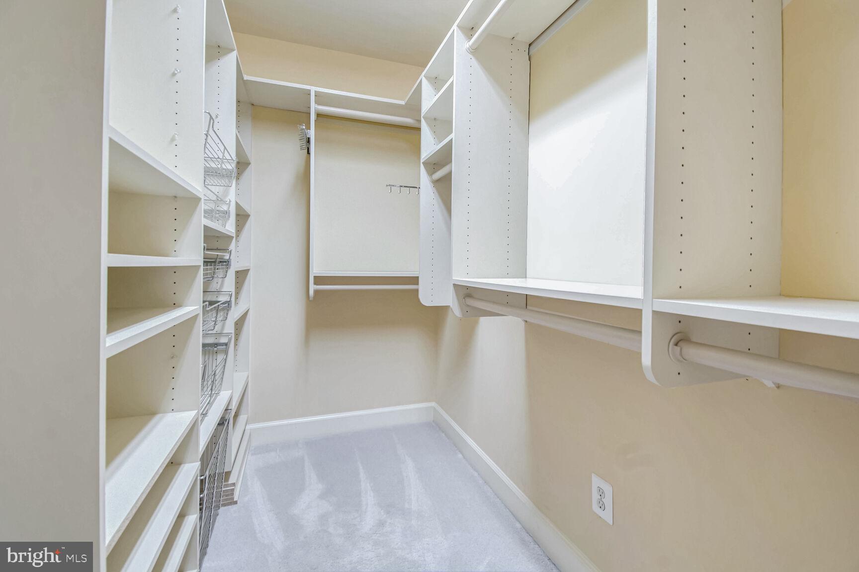 1550 Shelford Court Vienna, VA 22182 - Photo 50 of 60 a view of walk in closet with empty racks