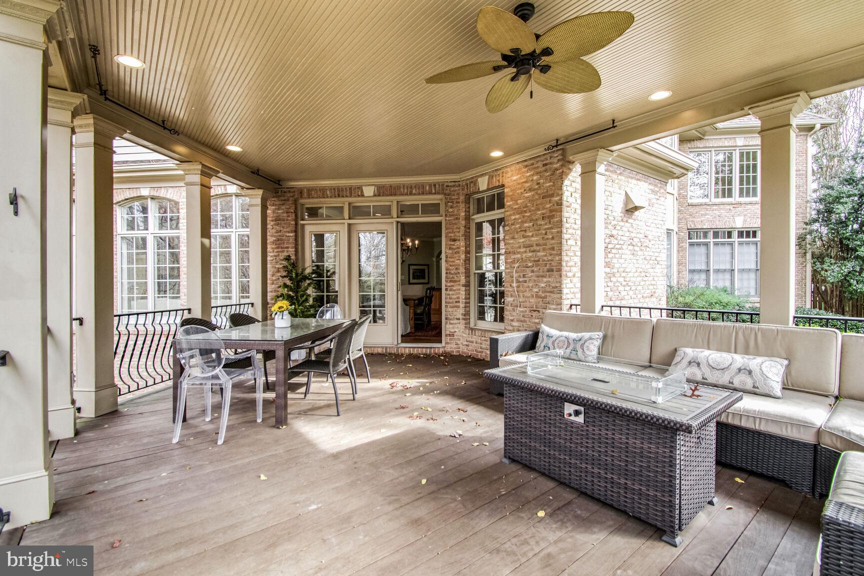 1550 Shelford Court Vienna, VA 22182 - Photo 58 of 60 a living room with furniture and a large window