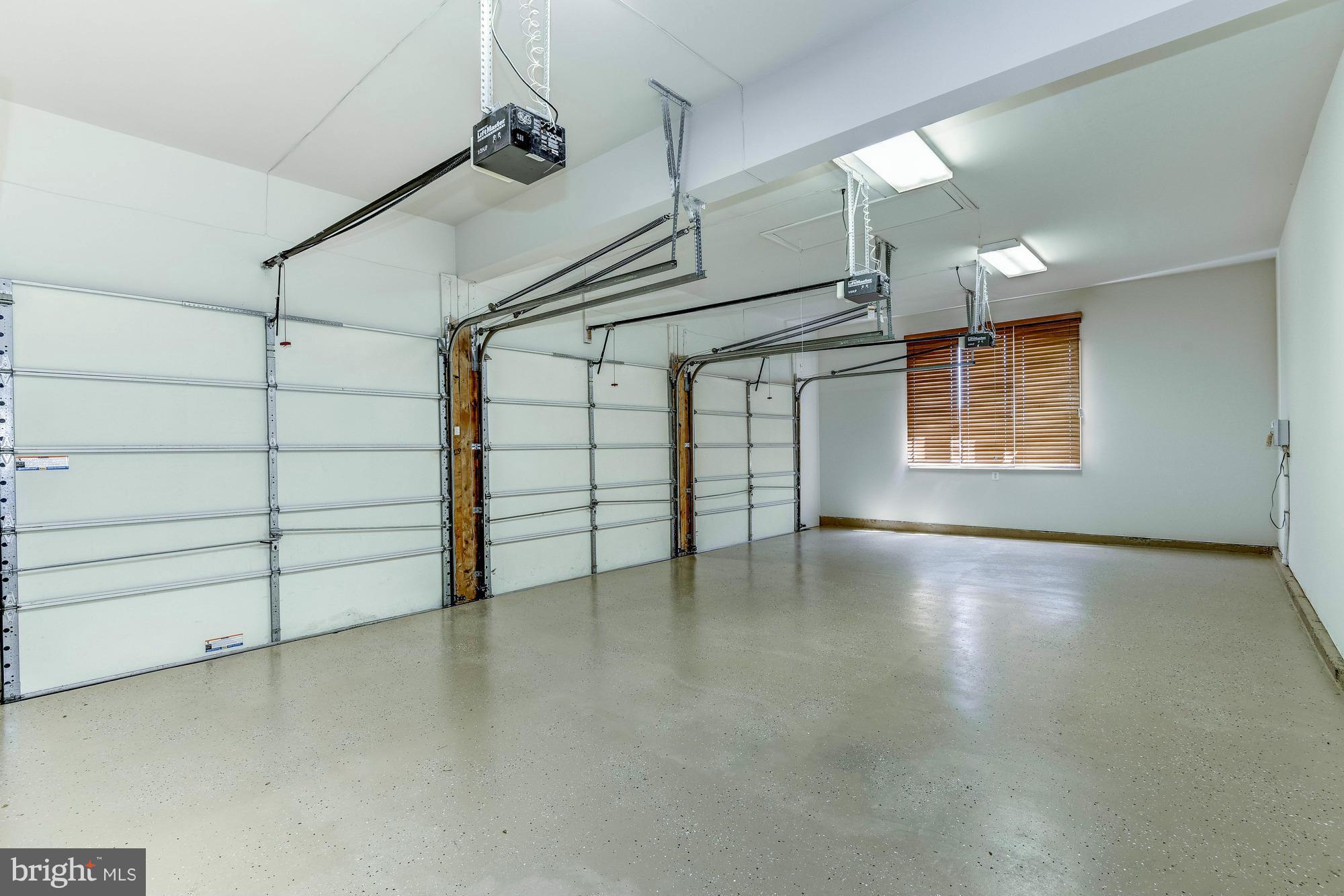 1550 Shelford Court Vienna, VA 22182 - Photo 8 of 60 a view of a livingroom with an empty space and a window