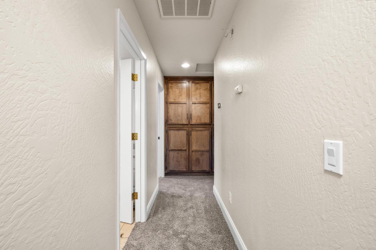 771 Mother Shipton Road Copperopolis, CA 95228 - Photo 43 of 72 Hallway on 3 bedroom separate wing.