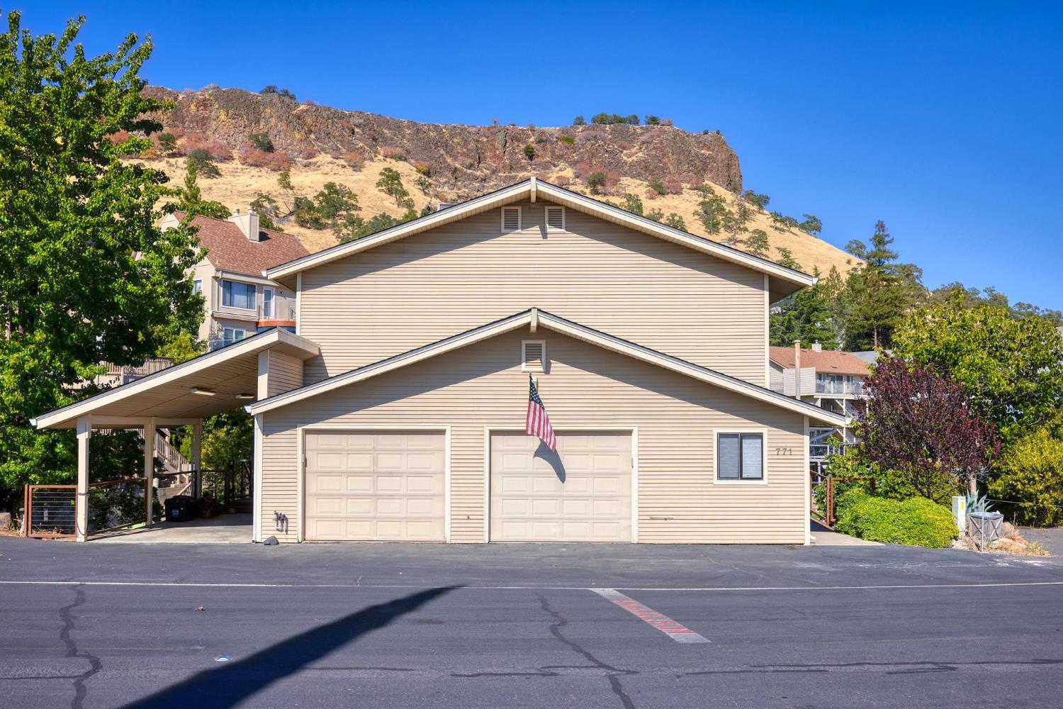 771 Mother Shipton Road Copperopolis, CA 95228 - Photo 7 of 72 Front with 2 car garage, covered carport & plenat of parking for guests!