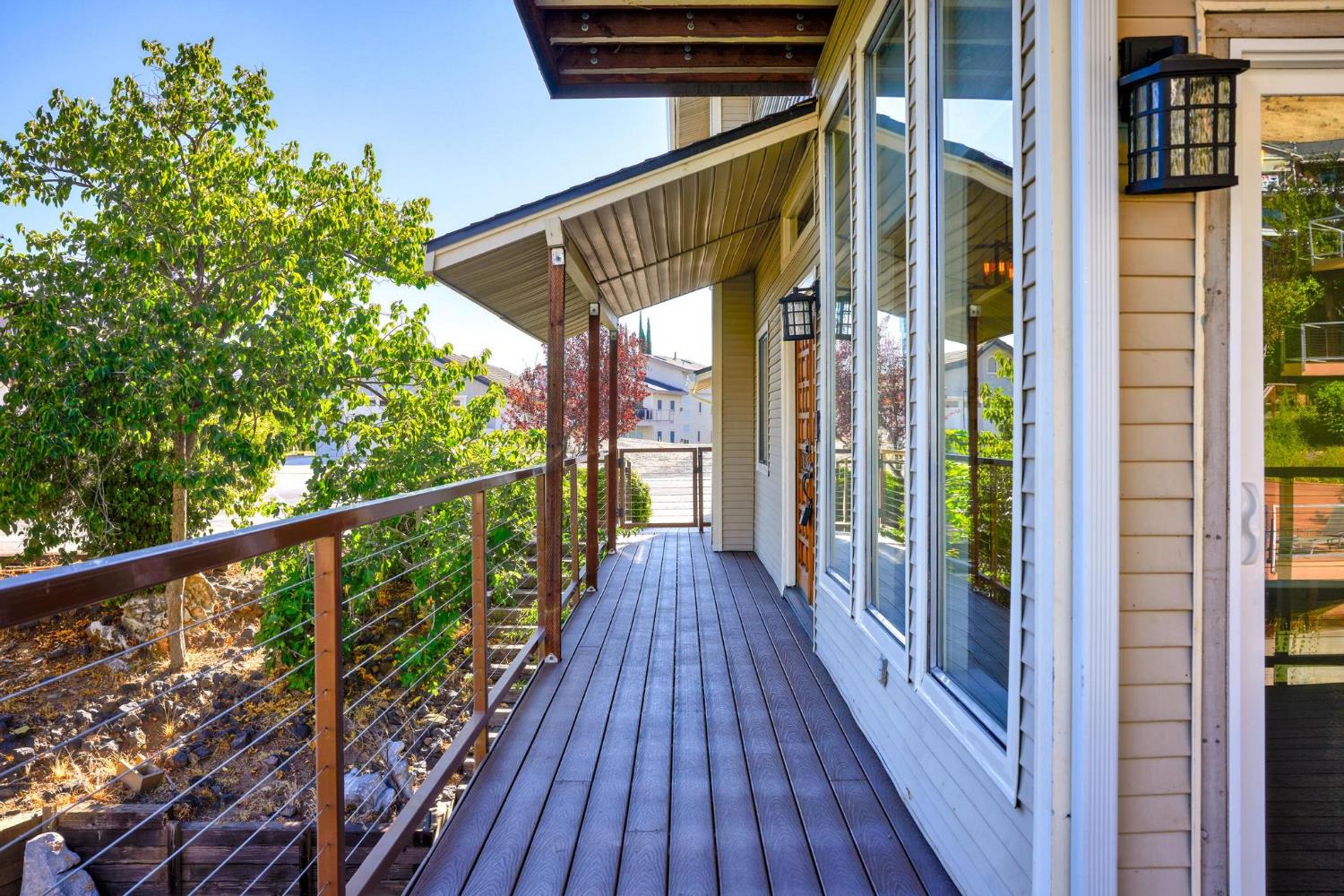 771 Mother Shipton Road Copperopolis, CA 95228 - Photo 10 of 72 Wrap around deck leading from street.