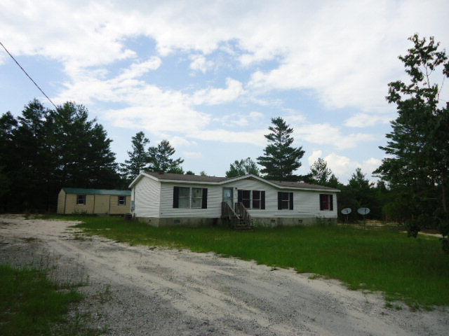 1371 Horne Road Roberta, GA 31078 - Photo 1 of 22 a view of a yard in front of house