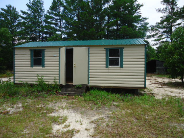 1371 Horne Road Roberta, GA 31078 - Photo 20 of 22 a view of a house with a yard