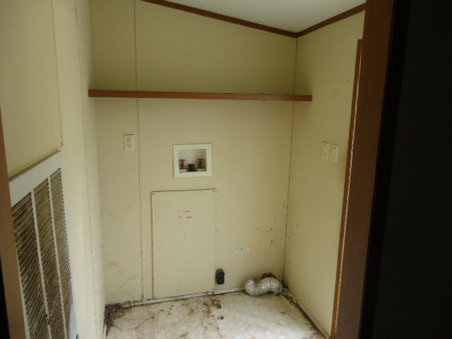 1371 Horne Road Roberta, GA 31078 - Photo 4 of 22 a bathroom with a sink and a mirror