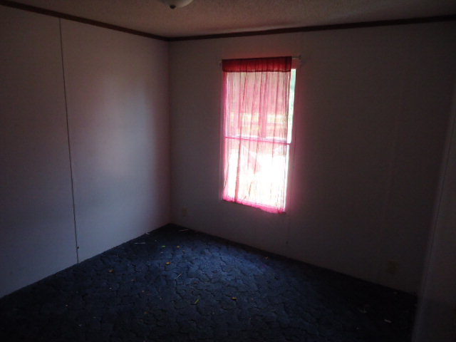 1371 Horne Road Roberta, GA 31078 - Photo 10 of 22 an empty room with a window