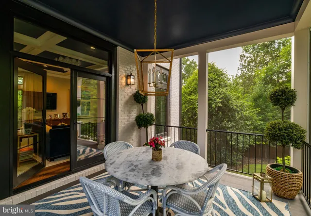 a view of a fountain in front of a house