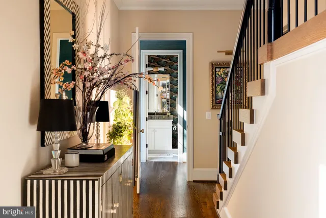 a view of a balcony with a couple of cars parked in garage