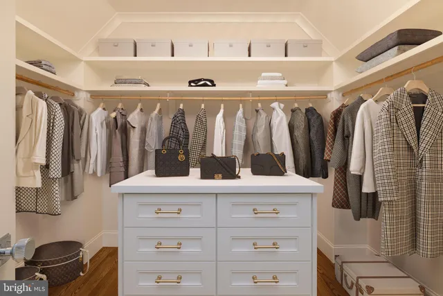 a view of room with window and furniture