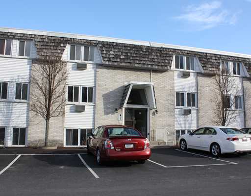 Exterior Front. You can t beat the location! Convenient to shopping and restaurants, within easy walking distance to downtown East Greenwich. The condo fee covers heat, water, sewer and gas cooking. Move right in!
