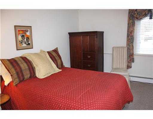 Bedroom. One of the two bedrooms with Berber carpet, a good sized closet and a large window for plenty of light.