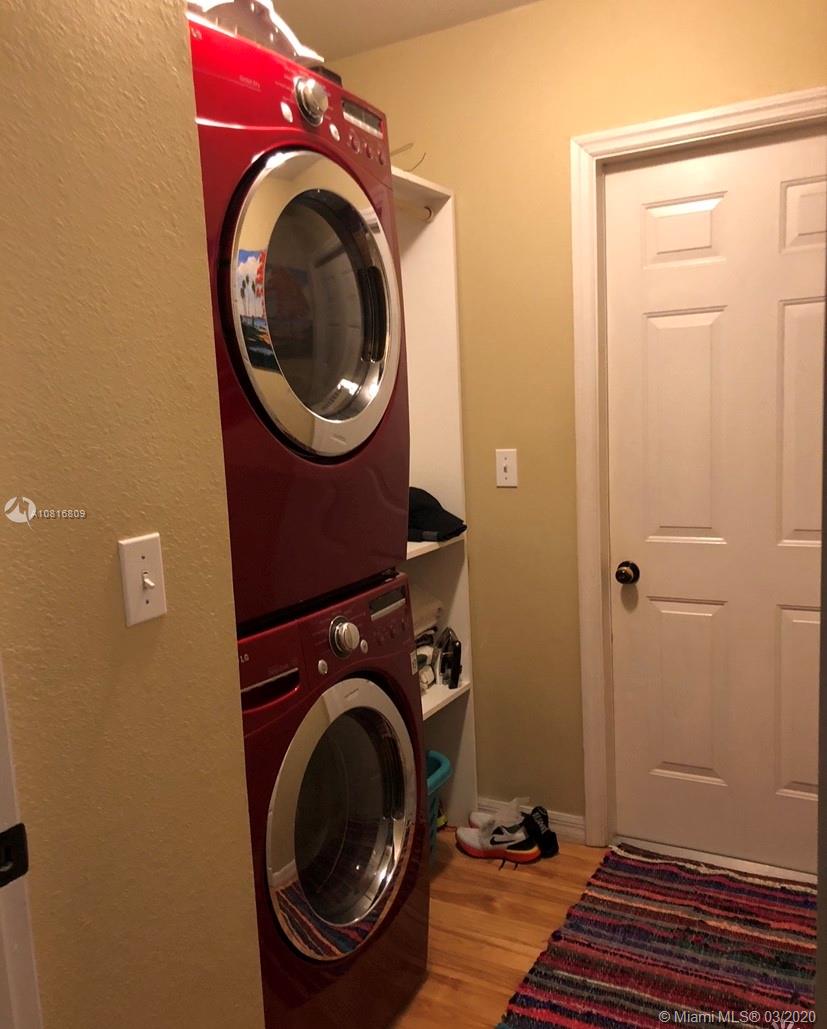 128 Kilpatrick Road Clewiston, FL 33440 - Photo 21 of 35 a utility room with dryer and washer