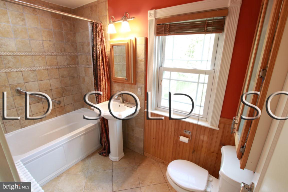 4304 Fordham Road Baltimore, MD 21229 - Photo 22 of 37 Full bathroom features a Solatube skylight!