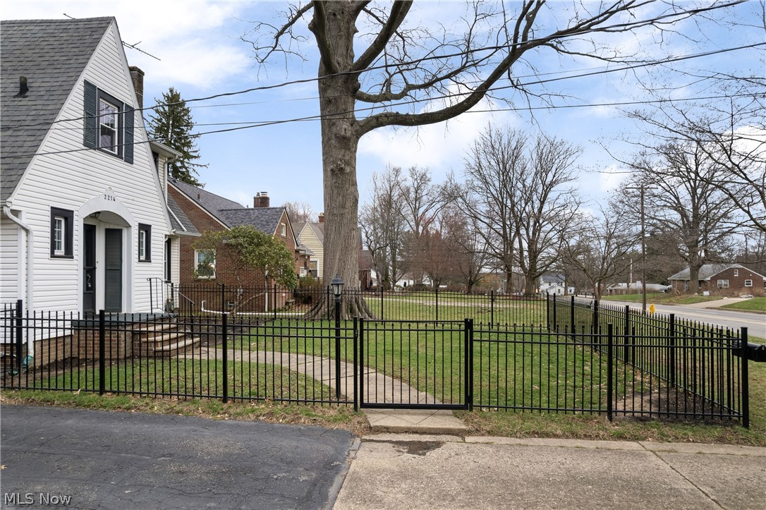 2214 Cleveland Road Wooster, OH 44691 - Photo 34 of 38 This classic style fence befits a home from this era. Perfect for keeping kids and pets alike safe.