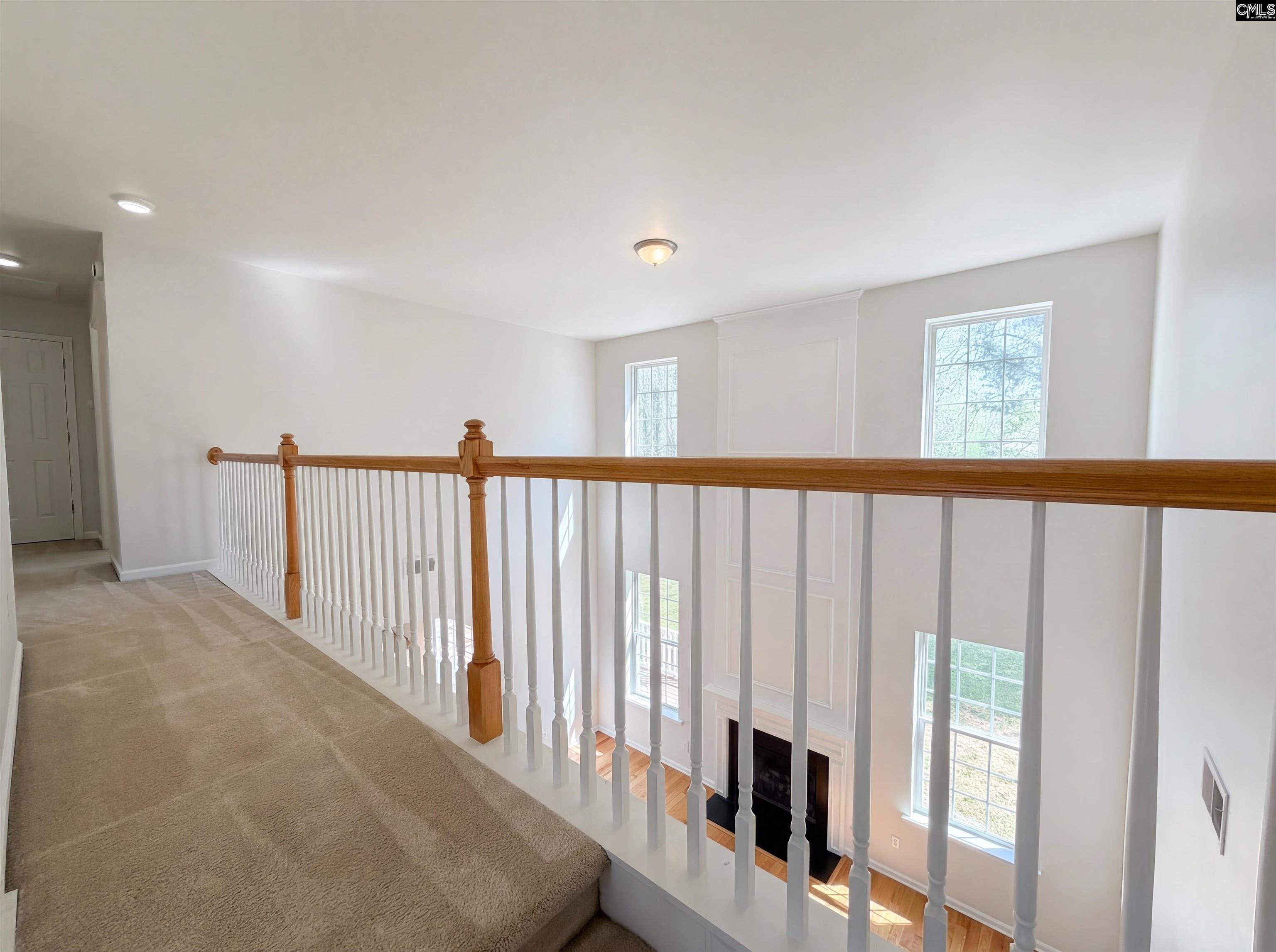 112 Coopers Hawk Circle Irmo, SC 29063 - Photo 25 of 26 a view of a hallway with windows