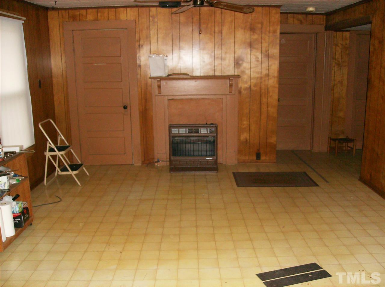 4455 Oxford Road Roxboro, NC 27574 - Photo 4 of 10 a room with a door