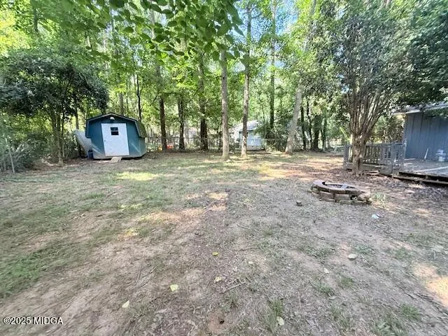 a fire hydrant in the middle of a field