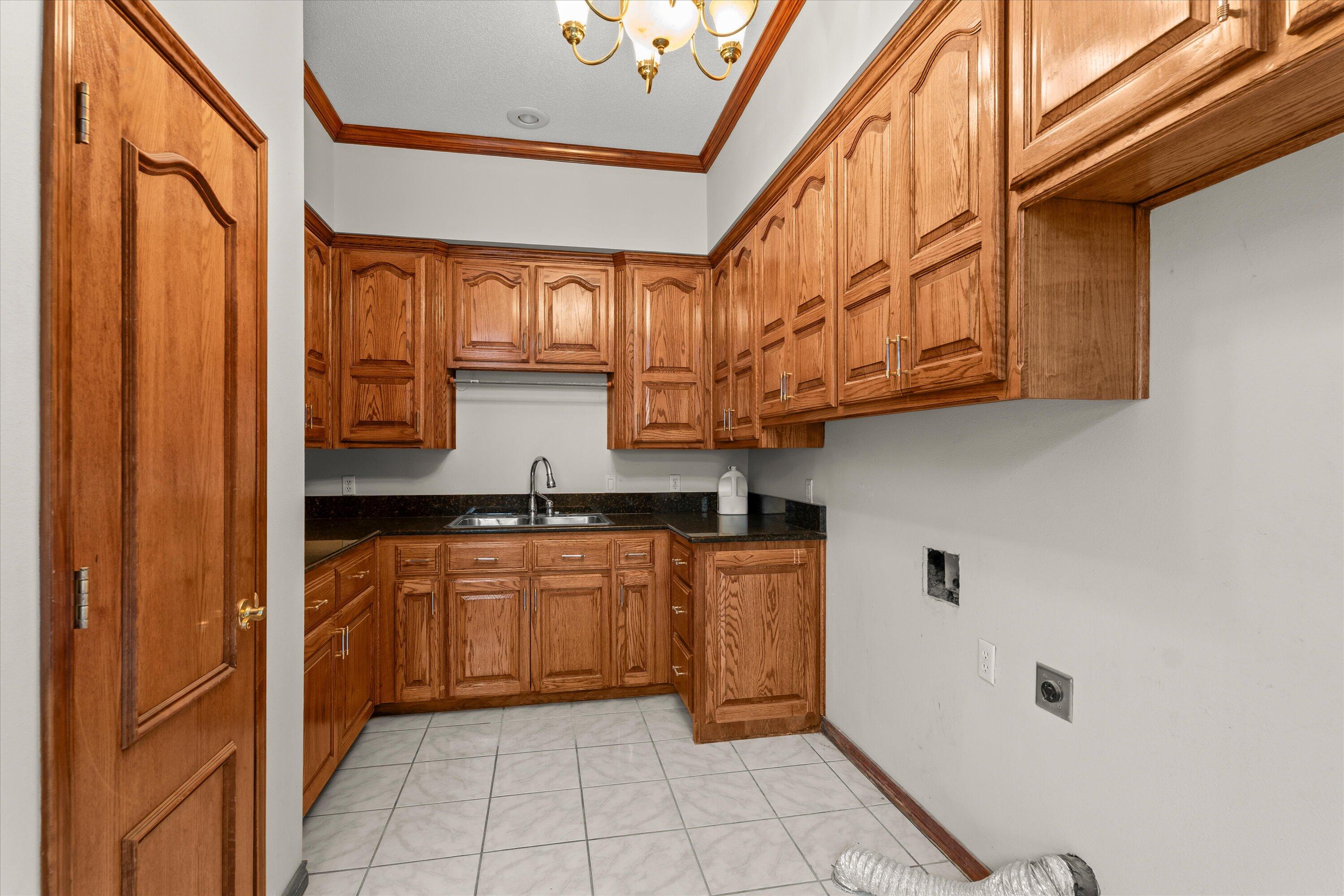 2404 York Avenue Lubbock, TX 79407 - Photo 17 of 88 a kitchen with stainless steel appliances granite countertop a sink and cabinets