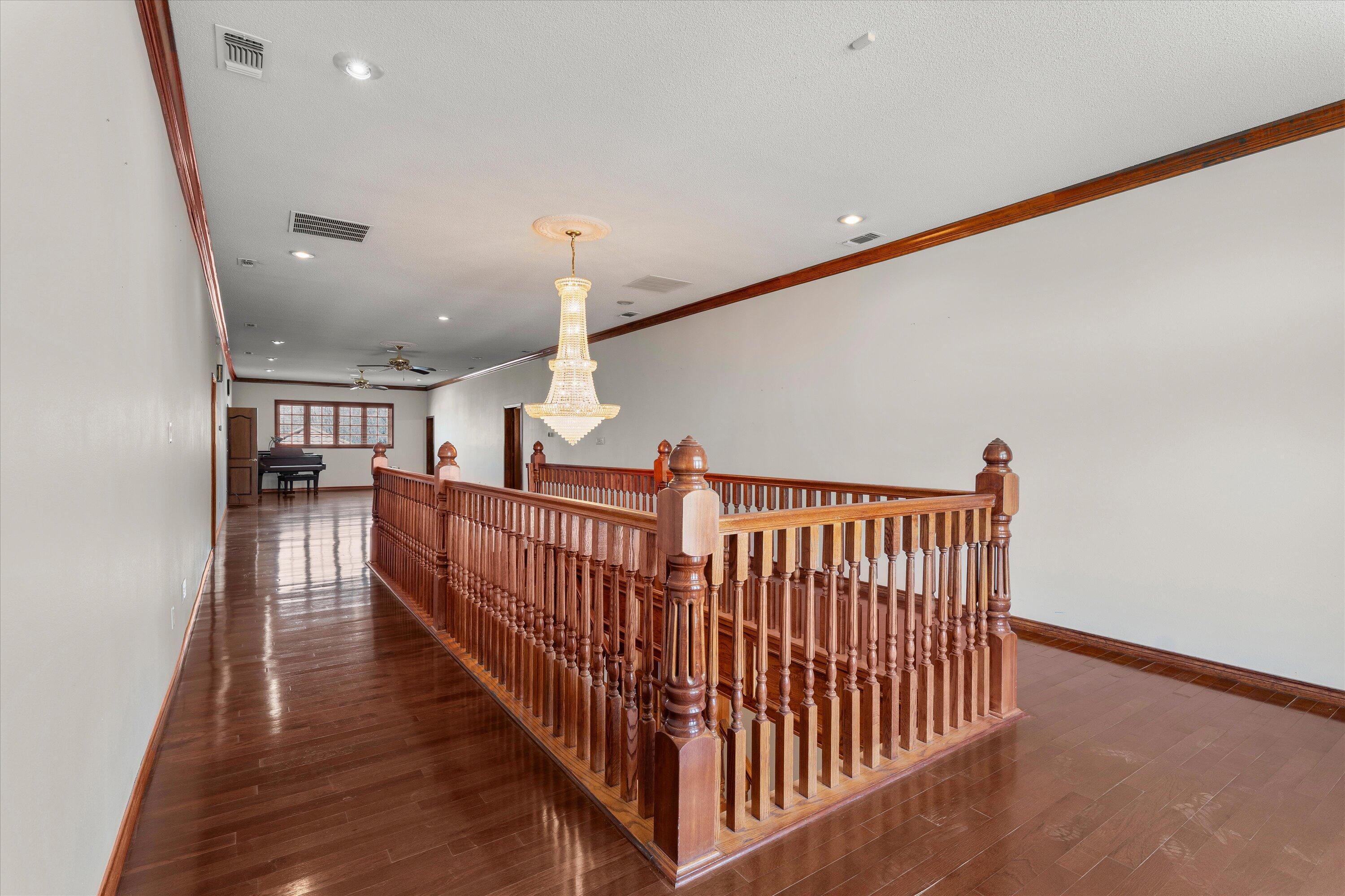2404 York Avenue Lubbock, TX 79407 - Photo 41 of 88 a view of staircase with wooden floor and stairs