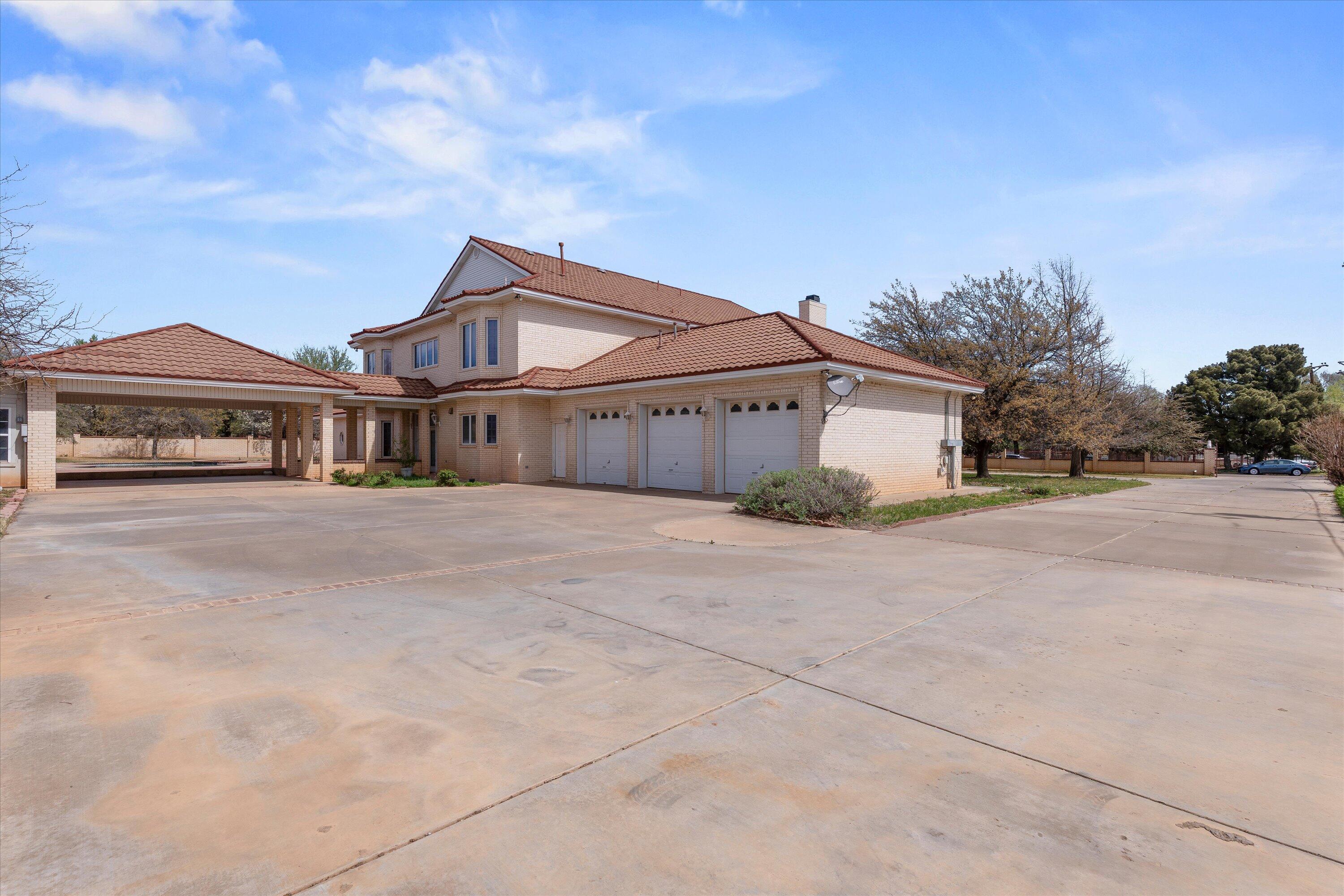 2404 York Avenue Lubbock, TX 79407 - Photo 78 of 88 a front view of a house with a yard