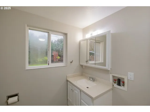 a view of a backyard with a small cabin