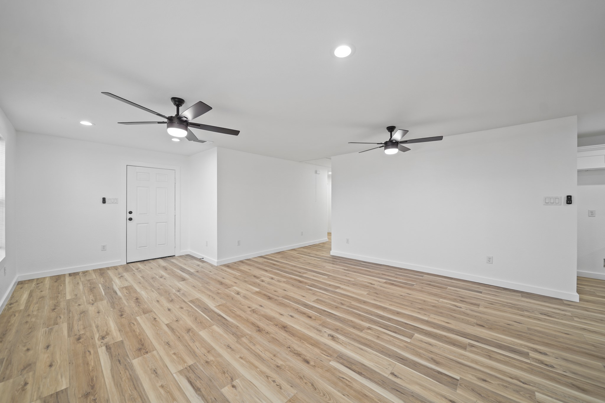 4154 Erby Street Houston, TX 77087 - Photo 24 of 36 a view of empty room with wooden floor