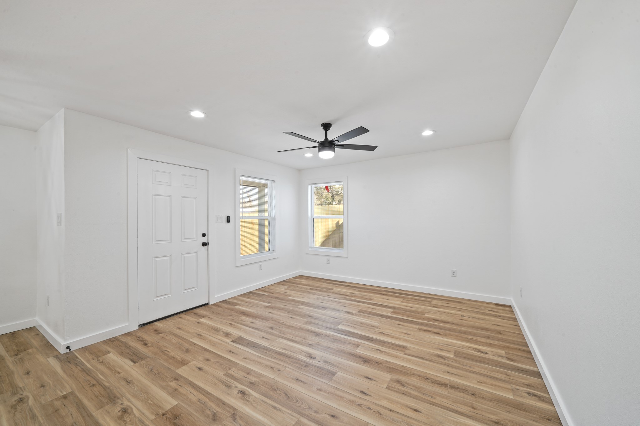 4154 Erby Street Houston, TX 77087 - Photo 5 of 36 a view of empty room with wooden floor