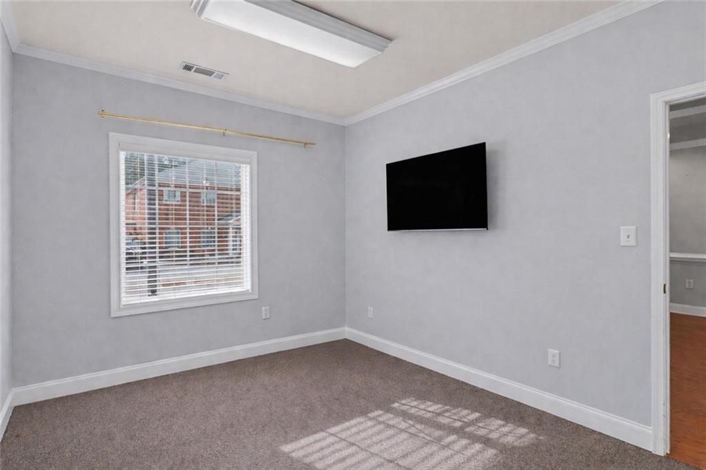 3745 Cherokee Street Northwest Kennesaw, GA 30144 - Photo 22 of 24 a view of a livingroom with a flat screen tv