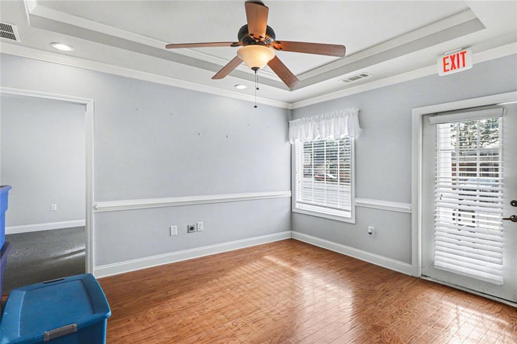 3745 Cherokee Street Northwest Kennesaw, GA 30144 - Photo 4 of 24 a view of an empty room with a window