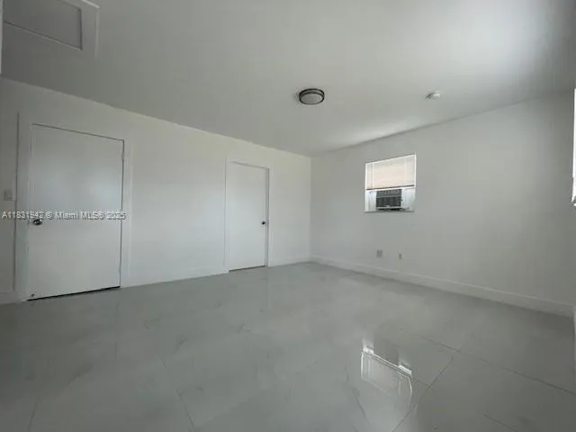 an empty room with a workbench